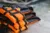 Closeup life jacket on wood table with river background, safety concept, selective focus