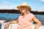 Retirement is all about going with the flow. a mature woman enjoying a relaxing boat ride.